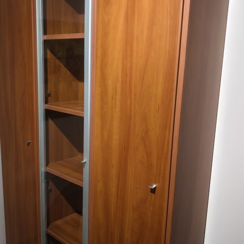 Trifylli bookshelf with two closed cabinets and one glass door