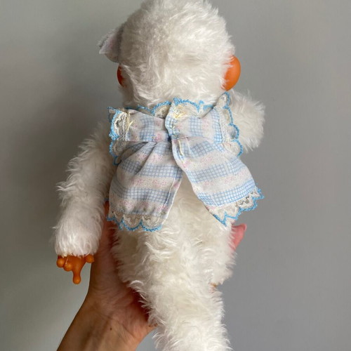 El Greco vintage white monkey plush toy in dress