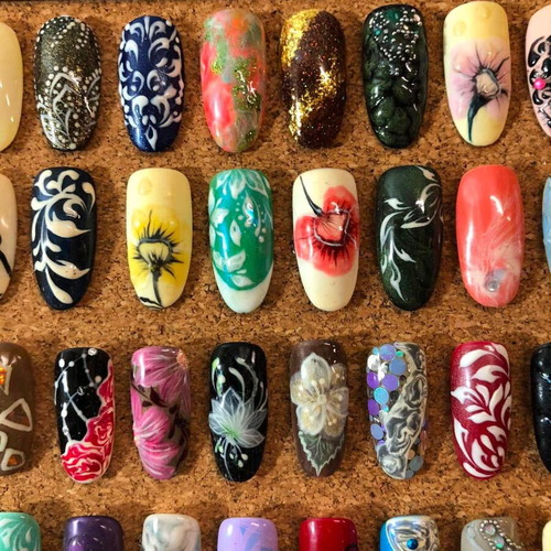 Board with 187 professional nail design tips, vintage collectible