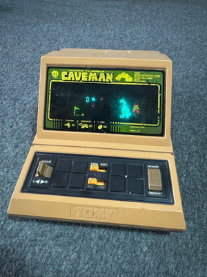 Tomy Jr. Caveman vs Dinosaur vintage electronic game
