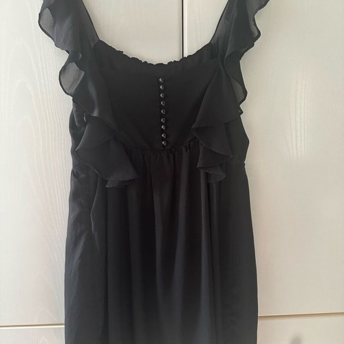 Black dress with ruffles used, size medium