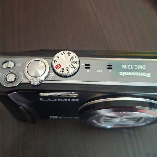 Panasonic Lumix DMC-TZ19 digital camera like new with Leica lens and tripod
