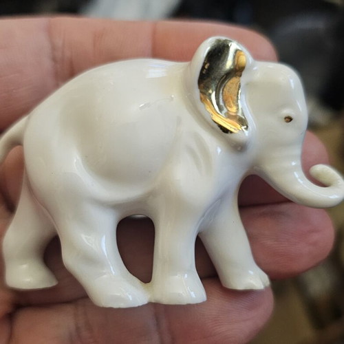 Sitzendorf porcelain elephant used, with leg flaw