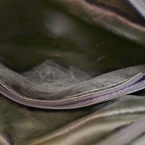Shoulder bag black genuine leather like new with elephant detail