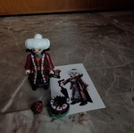 Vampire Lady figure with cake, umbrella and collectible sticker