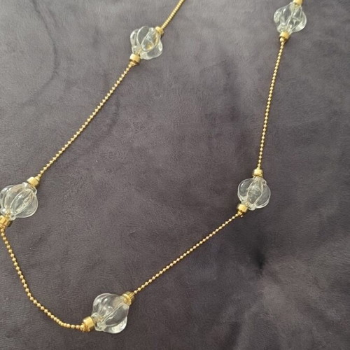 Faux necklace with long gold-coloured chain