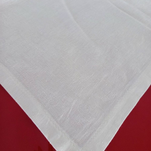 Handmade white jacquard tablecloth with embossed designs like new