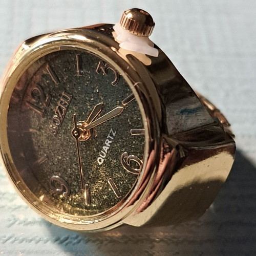 Ring watch quartz with khaki dial and gold bracelet like new