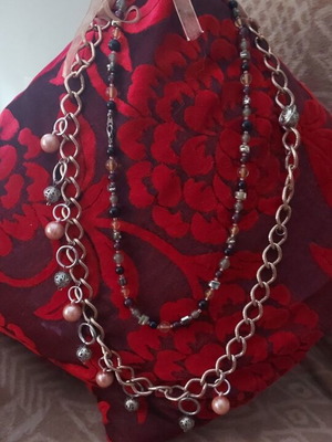 Two necklaces used in brown and bronze shades