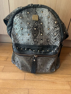 MCM Stark Python Print Backpack used, gray with studs