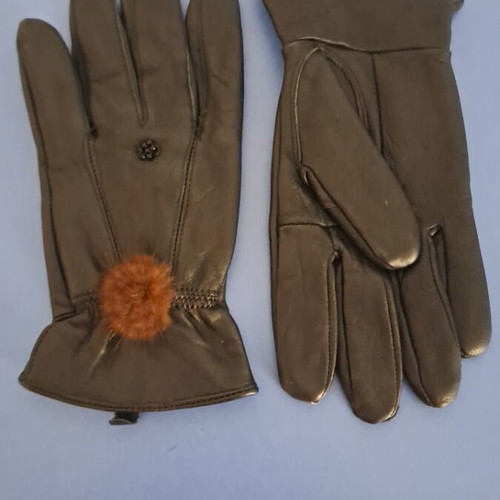 Leather gloves black with brown fur decoration, size medium like new