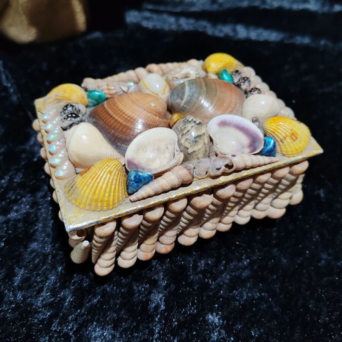 Vintage jewelry box with natural sea shells and royal velvet