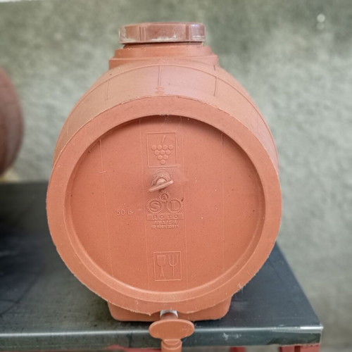 Plastic barrels 100 lt and 50 lt with 25 lt glass demijohn