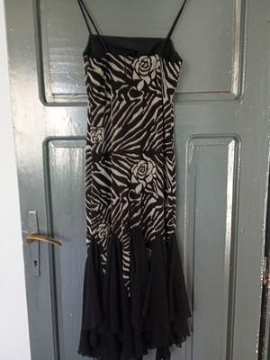 Elegant women's dress with black and white pattern, size M