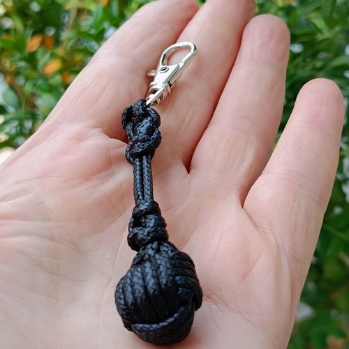 Handmade men's keychain with black leather cord and football ball