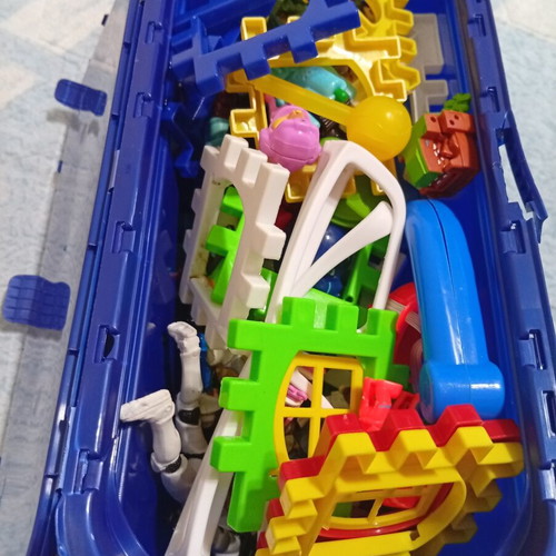 Toy pack with action figures, army men, and construction blocks like new