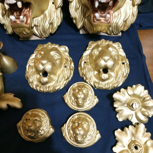 Decorative items used, cast iron lion heads, old antiques