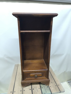 Vintage wooden multipurpose furniture with open shelf and drawer used
