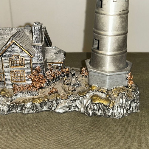 Vintage metal lighthouse decorative miniature with hidden compartment, like new