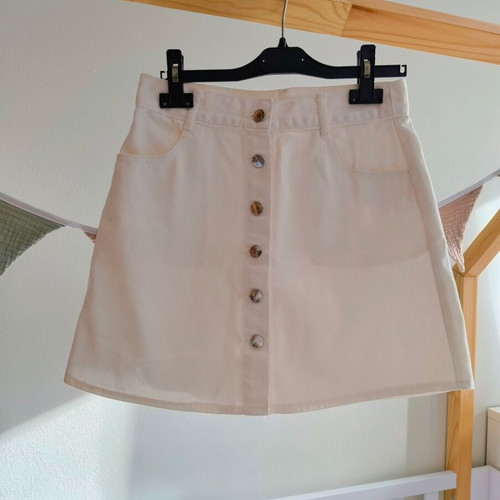 White denim skirt size S used with slight back mark