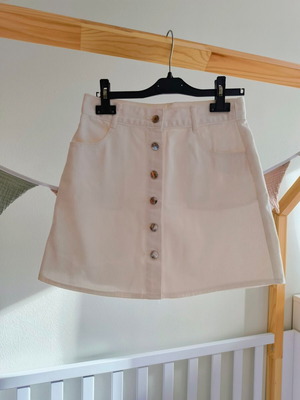 White denim skirt size S used with slight back mark