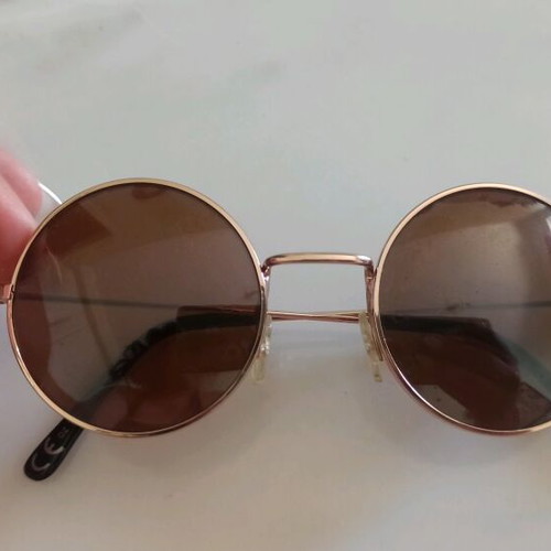 Round sunglasses used, metal frame, gold tone with brown lens