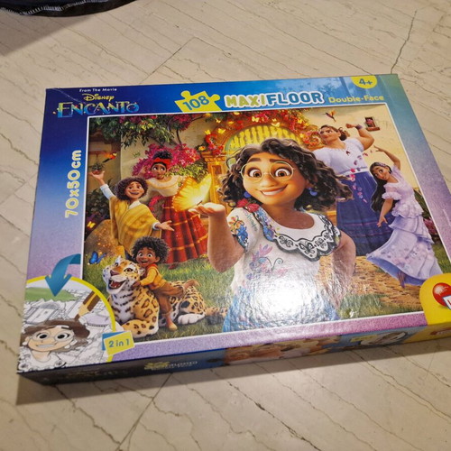 Encanto floor puzzle used, 104 pieces, double-sided