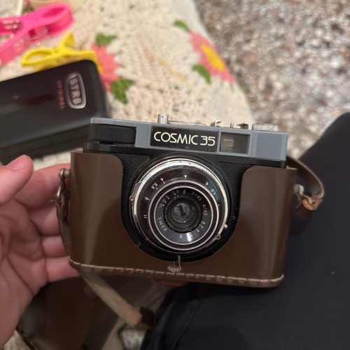 Cosmic 35 camera used, no film, normal condition