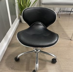 Work stool with backrest used, suitable for pedicure