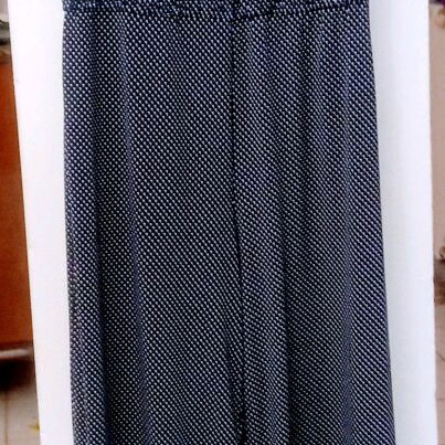 One-piece very stretchy with shoulder ruffle size L like new, blue
