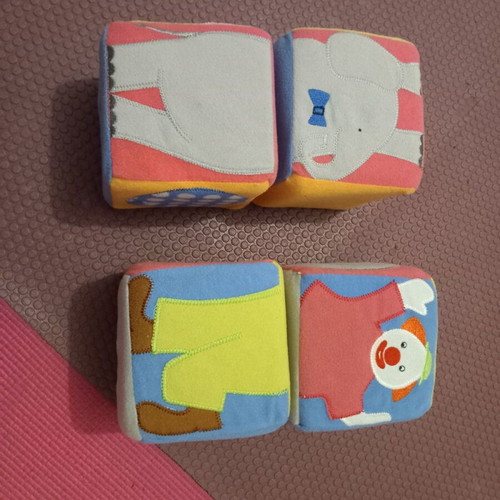 Soft plush blocks used, 4 plush cubes with designs