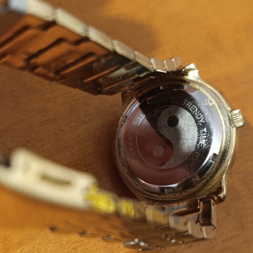 Daniel Klein wristwatch like new, gold bracelet, women's