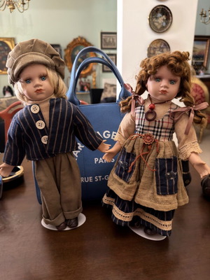 Porcelain doll couple like new, lifelike