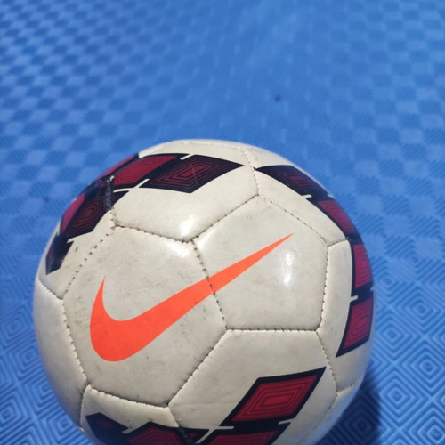 Nike soccer ball like new, white with orange logo