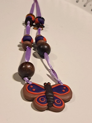 Ethnic necklace like new with glass, wooden, and polymer clay beads