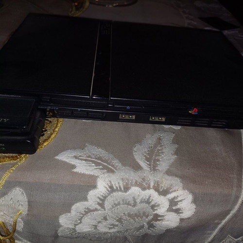 PlayStation 2 used with 12 games without controllers