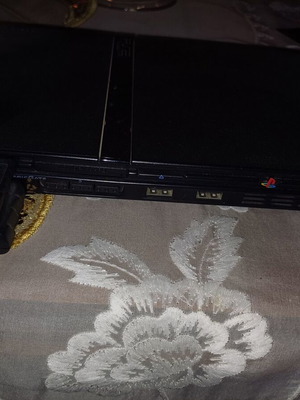 PlayStation 2 used with 12 games without controllers