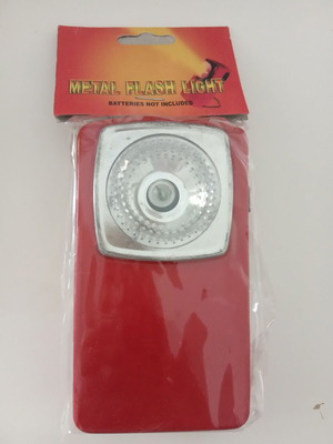 Vintage flashlight new in packaging with red reflective marking