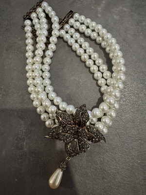 Vintage statement choker with three pearl strands and antique flower