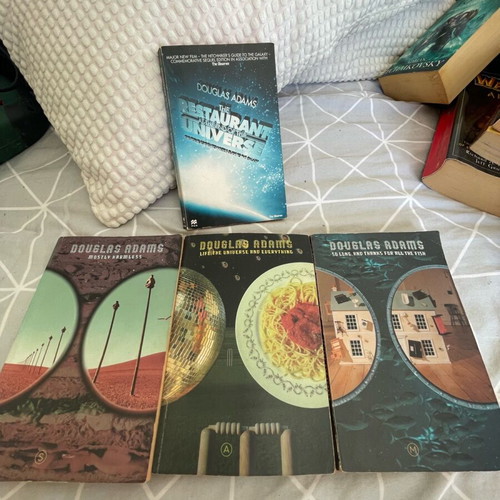Adam Douglas books used, set of 4, English