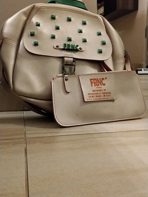 FRNC backpack bag like new, gold and silver
