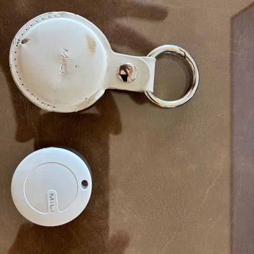 MiLi MiTag HD-P16 Android tag tracker used with case and new battery