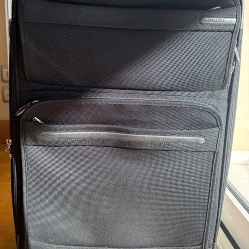 Delsey Black Medium Suitcase used with wheels