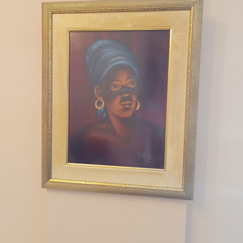 Framed portrait of an African woman like new