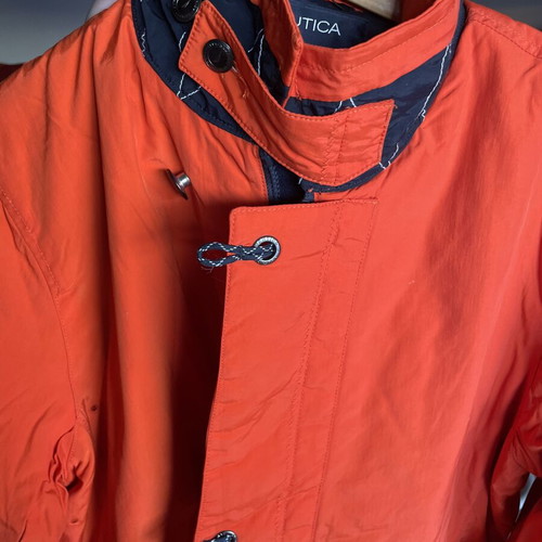 Nautica waterproof orange jacket with reflective lines