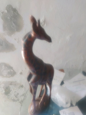 Wooden giraffe relief like new