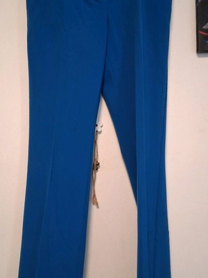 Set pants and top with net design, like new, spring blue