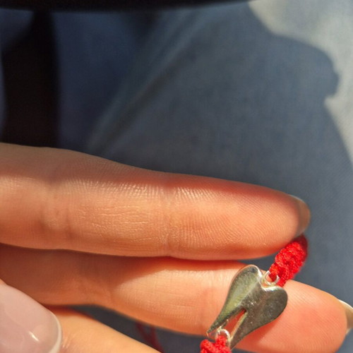Adjustable red bracelet like new