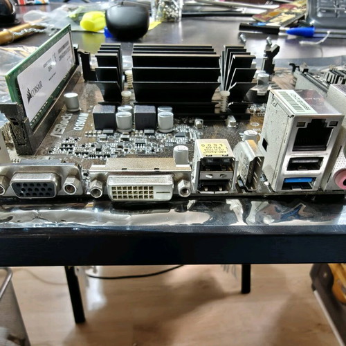ASRock Q1900M motherboard used with Intel Celeron J1900 CPU and 4GB DDR3 RAM