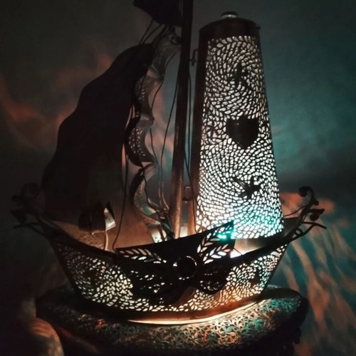 Vintage perforated metal boat lamp with lighthouse, used
